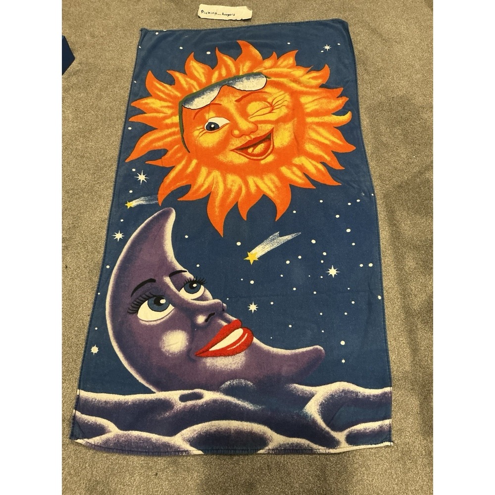 Vintage Copa Crescent celestial faces beach towel featuring a sun & moon design